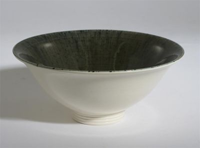 Appraisal: A Wedgwood earthenware bowl by Norman Wilson on shallow foot