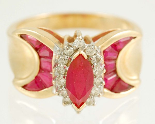 Appraisal: Synthetic ruby and diamond cluster ring in marked K yellow