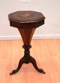 Appraisal: A Victorian rosewood and fruitwood inlaid octagonal work table x