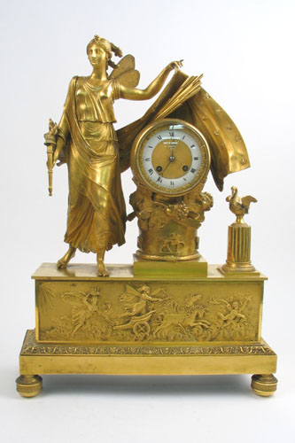 Appraisal: TIFFANY AND COMPANY GILT BRONZE FRENCH FIGURAL CLOCK A winged