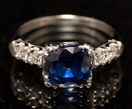 Appraisal: Lady's platinum diamond and cushion-shaped sapphire ring sapphire approximately cts