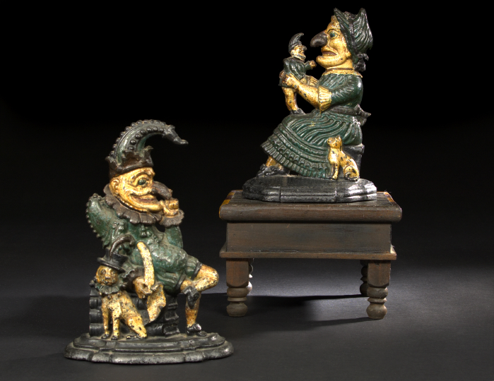 Appraisal: Rare Pair of English Polychromed Cast-Iron Figural Doorstops depicting Punch