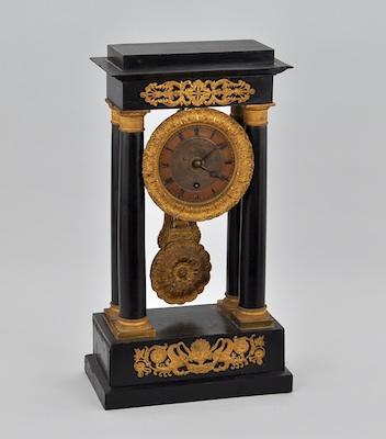 Appraisal: French Empire Style Ebonized Wood Ormolu Mounted Portico Clock Probably