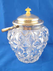 Appraisal: A silver mounted cut glass swing handled biscuit barrel the