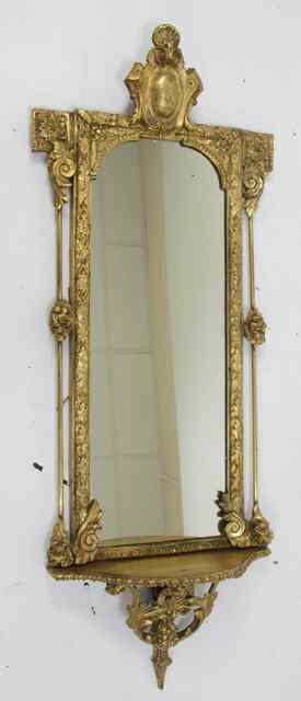 Appraisal: A th Century carved gilt wood and gesso wall mirror