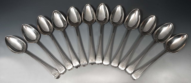 Appraisal: A SET OF TWELVE SILVER OLD ENGLISH PATTERN TABLE SPOONS