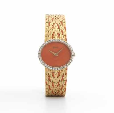 Appraisal: A Piaget Gold Diamond and Coral Watch k oval case