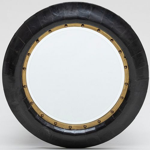 Appraisal: CONTEMPORARY BRASS GILTWOOD AND EBONIZED CIRCULAR MIRRORFitted with a beveled