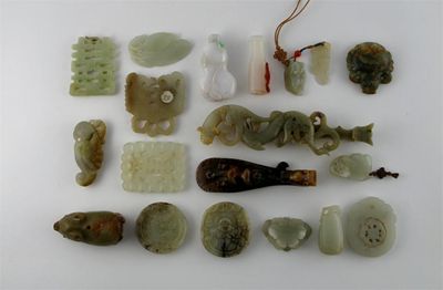 Appraisal: Nineteen jade and hardstone carvings comprising two belt hooks four