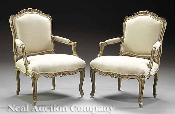 Appraisal: A Pair of Louis XV-Style Carved Cr me Peinte Fauteuils