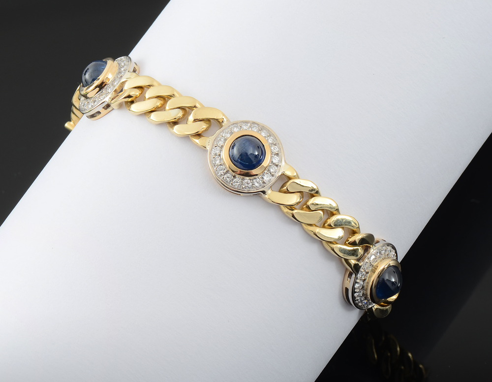 Appraisal: BISARELLO DIAMOND AND SAPPHIRE BRACELET K yellow gold fancy link