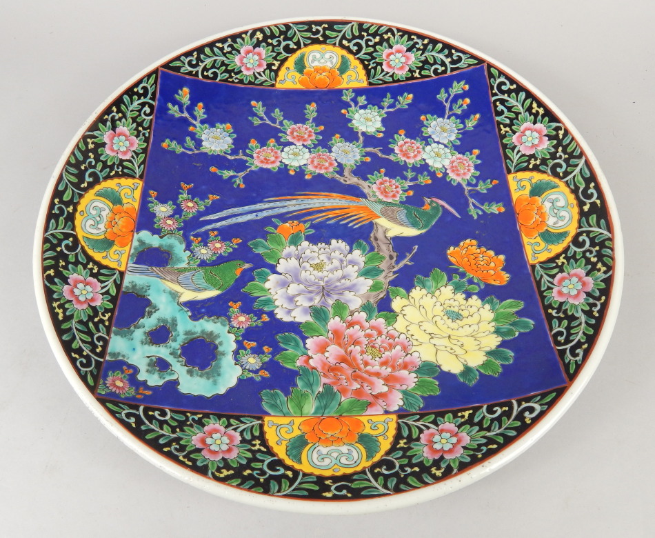 Appraisal: A thC Chinese pottery charger of circular outline with a