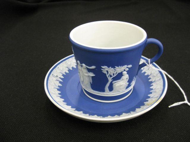 Appraisal: Wedgwood Dark Blue Jasperware Cup Saucer classical scenes with maidens