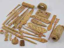 Appraisal: A quantity of gaming pieces and other bone artefacts including