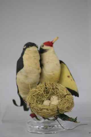 Appraisal: TWO BIRDS ON NEST ORNAMENT Germany two spun and pressed