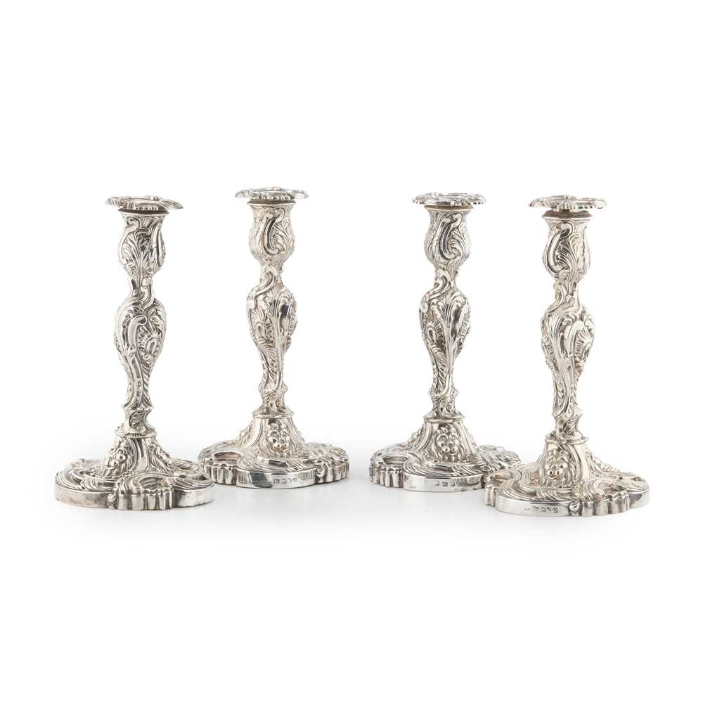 Appraisal: AMENDMENT A SUITE OF FOUR GEORGE III TABLE CANDLESTICKS AND