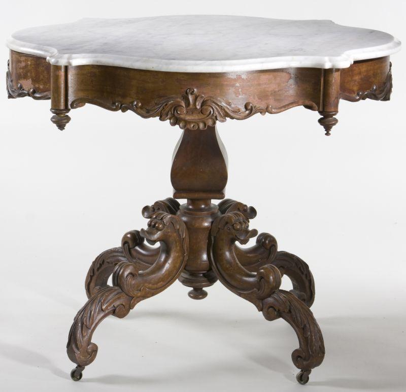 Appraisal: American Rococo Parlor Table circa s mahogany and mahogany veneers