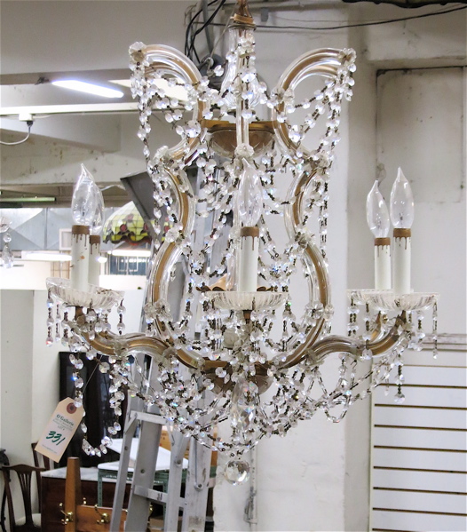 Appraisal: LOUIS XV STYLE CRYSTAL CHANDELIER having seven candlestick lights hung