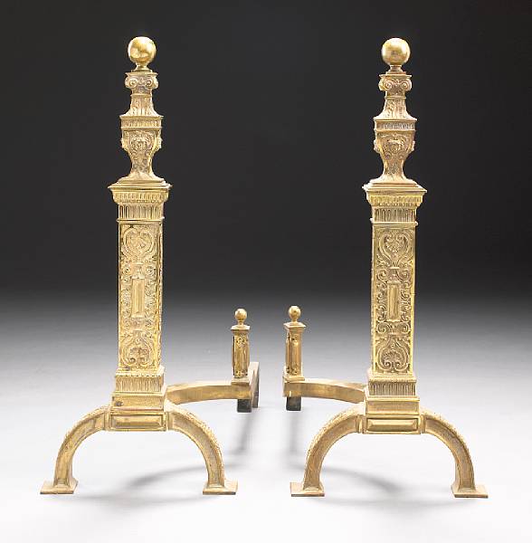 Appraisal: A pair of Neoclassical style bronze andirons first quarter th