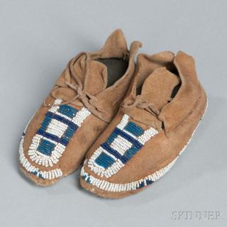 Appraisal: Cheyenne Beaded Hide Infant's Moccasins c s partially beaded with