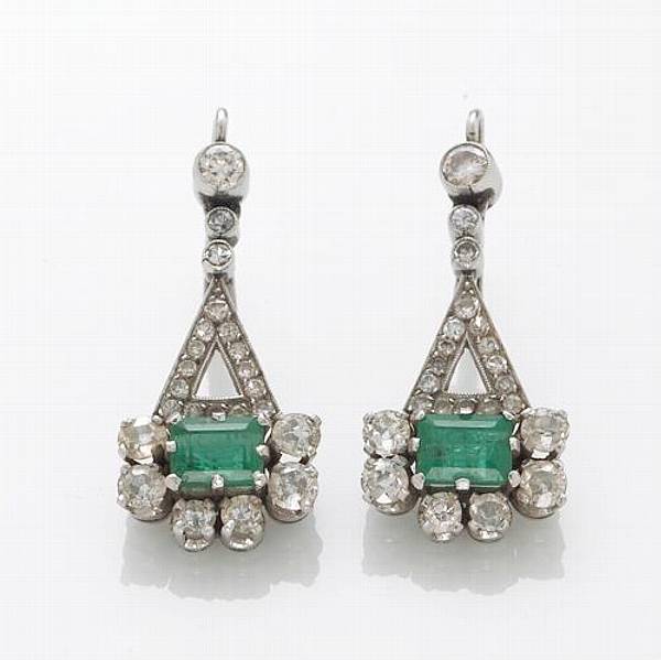 Appraisal: A pair of emerald diamond and platinum earrings estimated total