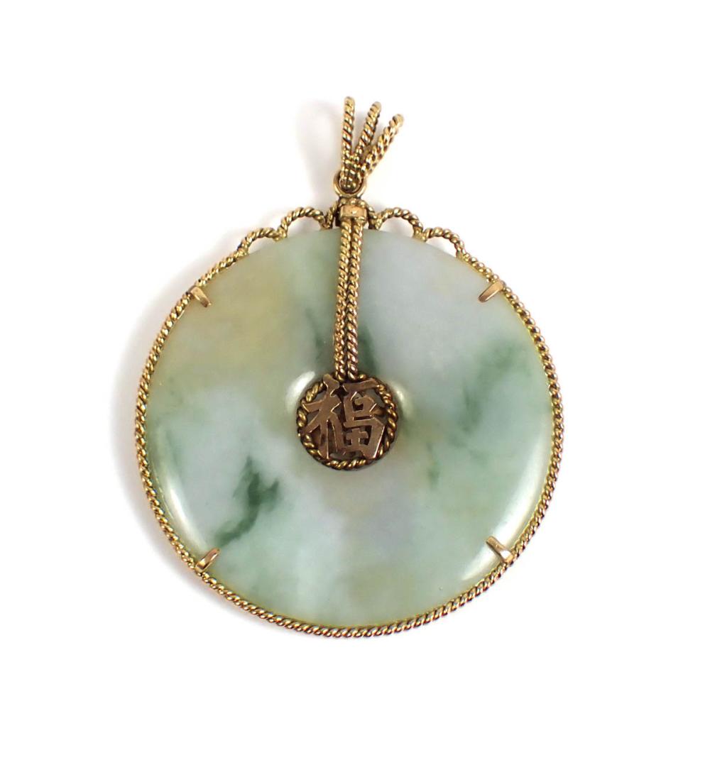 Appraisal: CHINESE JADE AND FOURTEEN KARAT GOLD PENDANT with a large