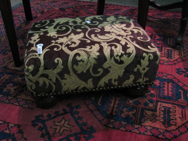 Appraisal: Decorator Quality Upholstered Ottoman with nail head trim and bun