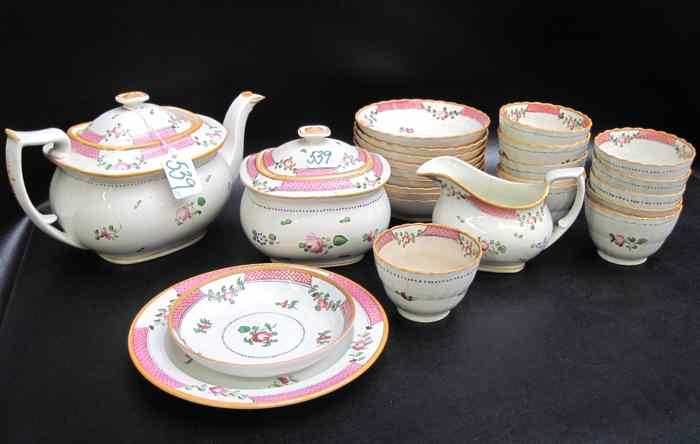 Appraisal: TWENTY-FIVE PIECE FRENCH PORCELAIN TEA SET with hand enameled floral