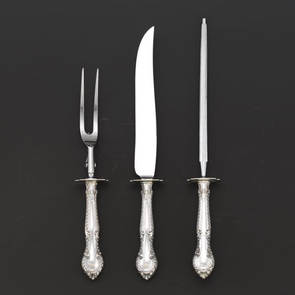 Appraisal: STERLING SILVER CARVING SET Sterling silver handles with stainless blades