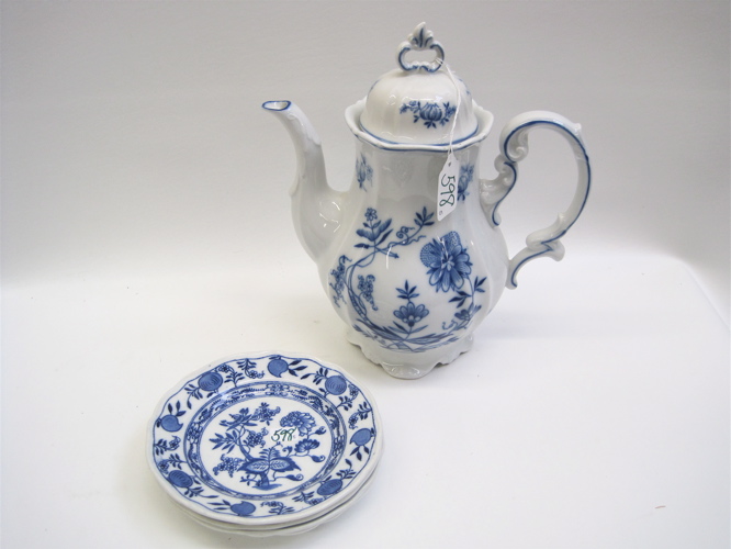 Appraisal: PORCELAIN TEAPOT AND BREAD PLATES pieces in Blue Onion pattern