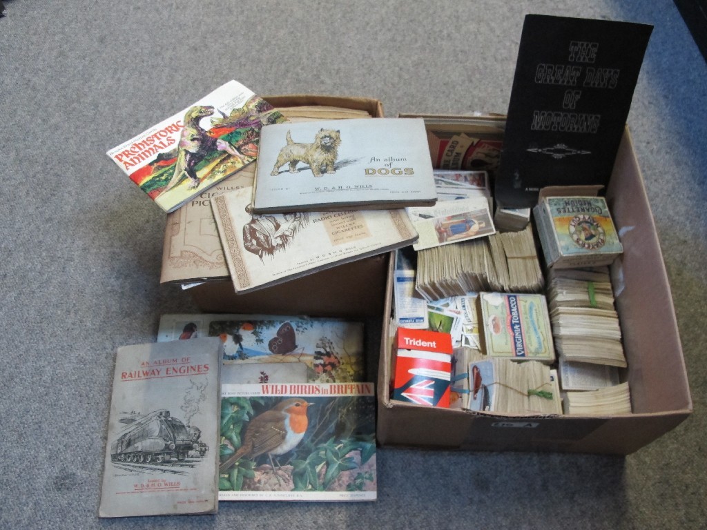 Appraisal: A lot comprising two boxes of albums of cigarette cards