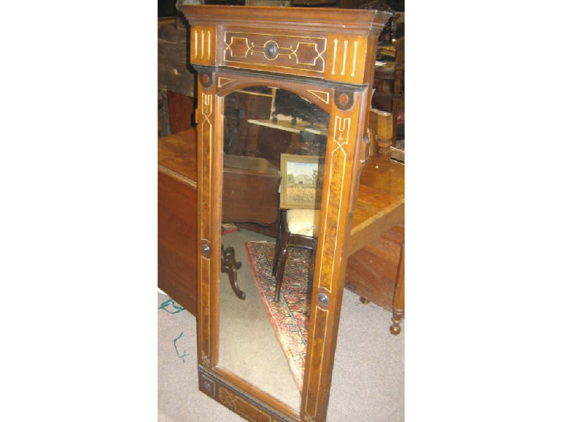 Appraisal: RENAISSANCE REVIVAL WALL MIRROR The walnut frame with gilt decoration