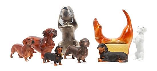 Appraisal: A Group of Eight Dachshund Figures Height of tallest inches