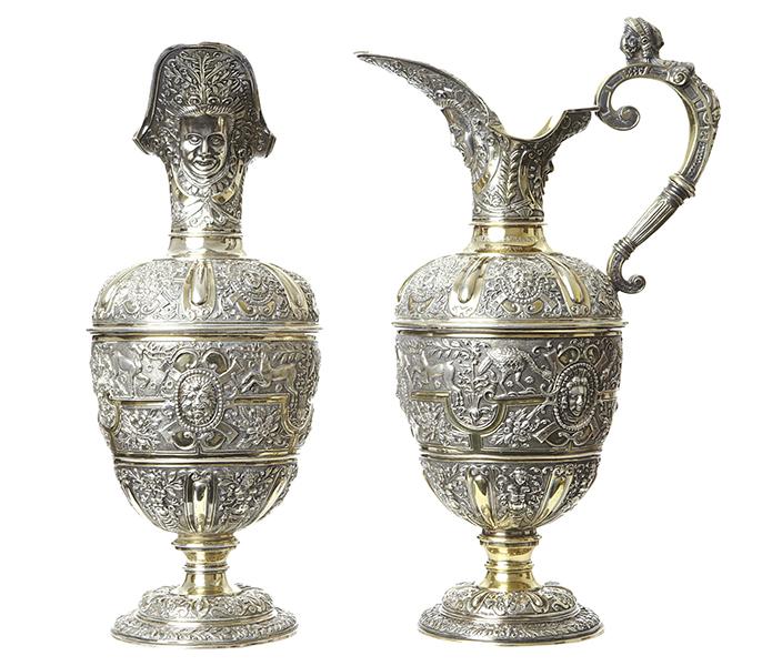 Appraisal: A PAIR OF VICTORIAN SILVER-GILT CELLINI DESIGN CLARET JUGS GEORGE