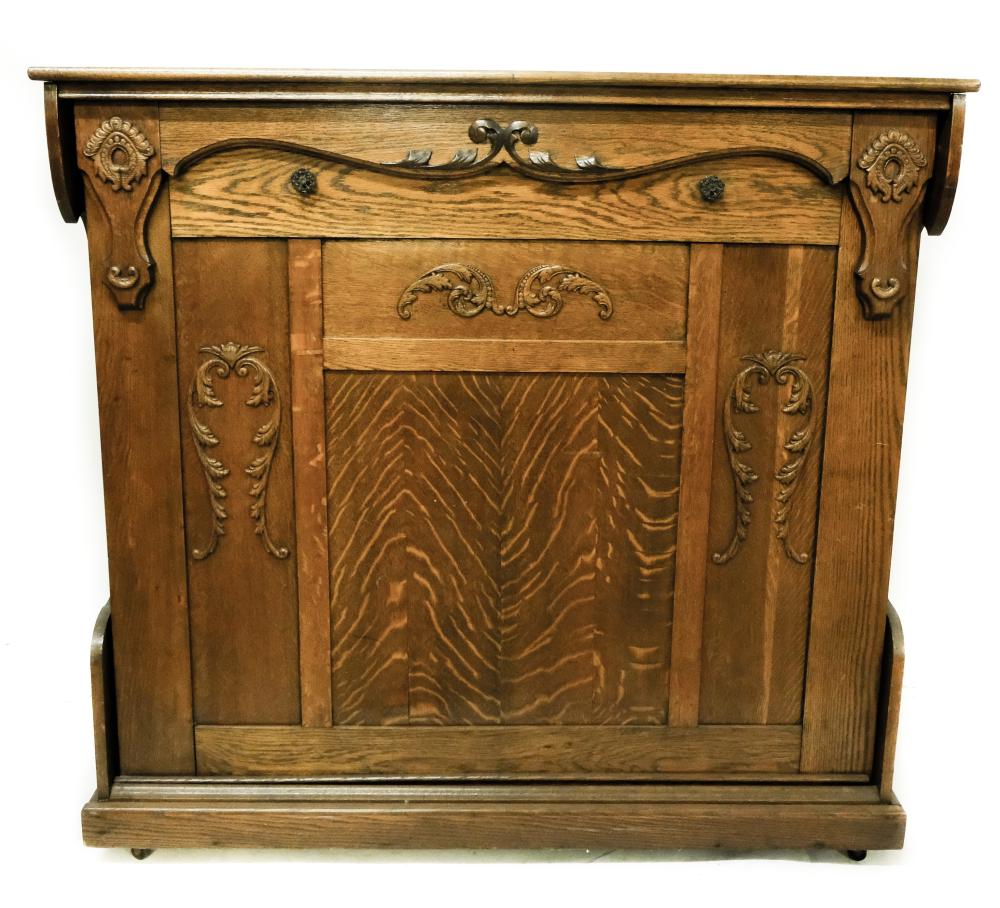 Appraisal: American oak carved murphy bed with superstructure centered with mirror