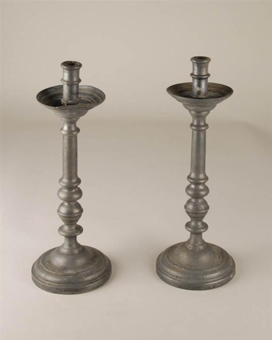 Appraisal: A Tall Pair of Early Pewter Candlesticks with self bobeches