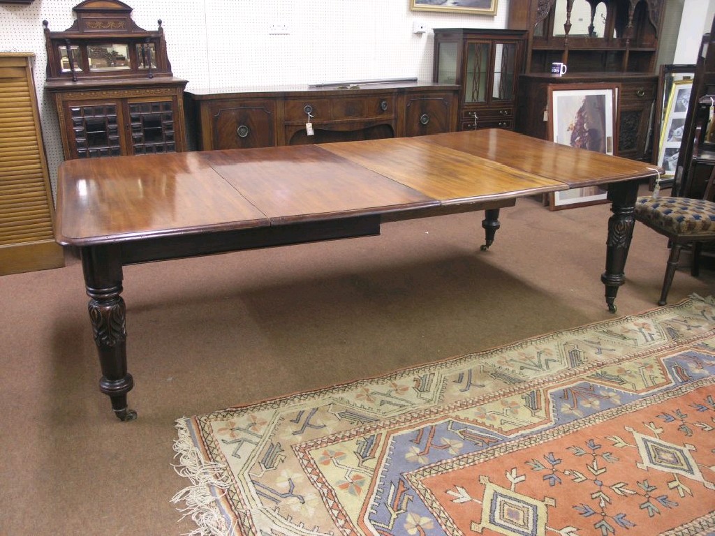 Appraisal: A mid Victorian mahogany dining extending dining table with two