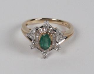 Appraisal: K EMERALD AND DIAMOND LADY'S RING K YELLOW GOLD EMERALD