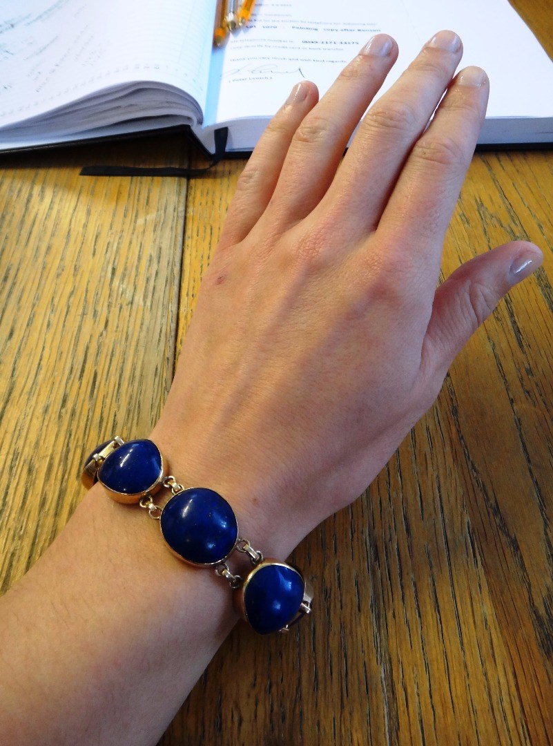 Appraisal: A gold mounted lapis lazuli set bracelet the links mounted