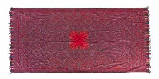 Appraisal: A Woven Paisley Shawl having a bright red central medallion