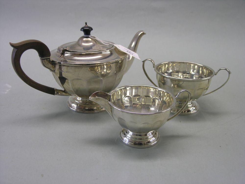 Appraisal: A silver tea set comprising teapot two handled sugar bowl