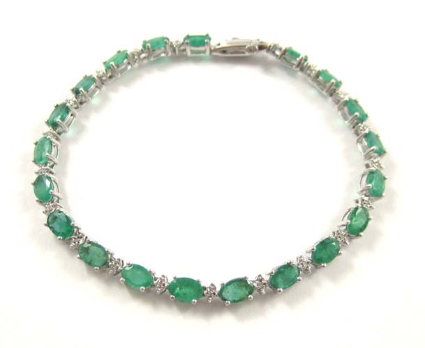 Appraisal: EMERALD DIAMOND AND TEN KARAT WHITE GOLD BRACELET - inches