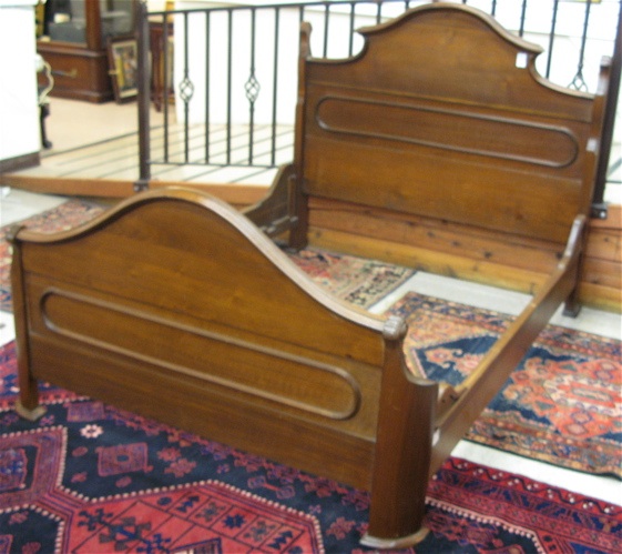 Appraisal: MID-VICTORIAN WALNUT BED WITH RAILS American c - the headboard