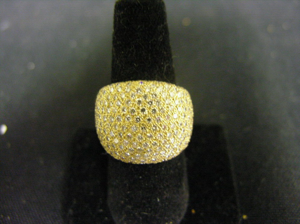 Appraisal: LADIES PAVE DIAMOND FASHION RING mounted in kt yellow gold