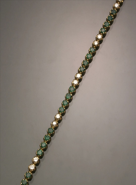 Appraisal: -Karat Yellow-Gold Diamond and Emerald Tennis Bracelet Set with fourteen