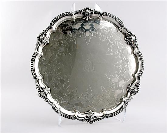 Appraisal: European silverplate round serving tray late th century beaded and