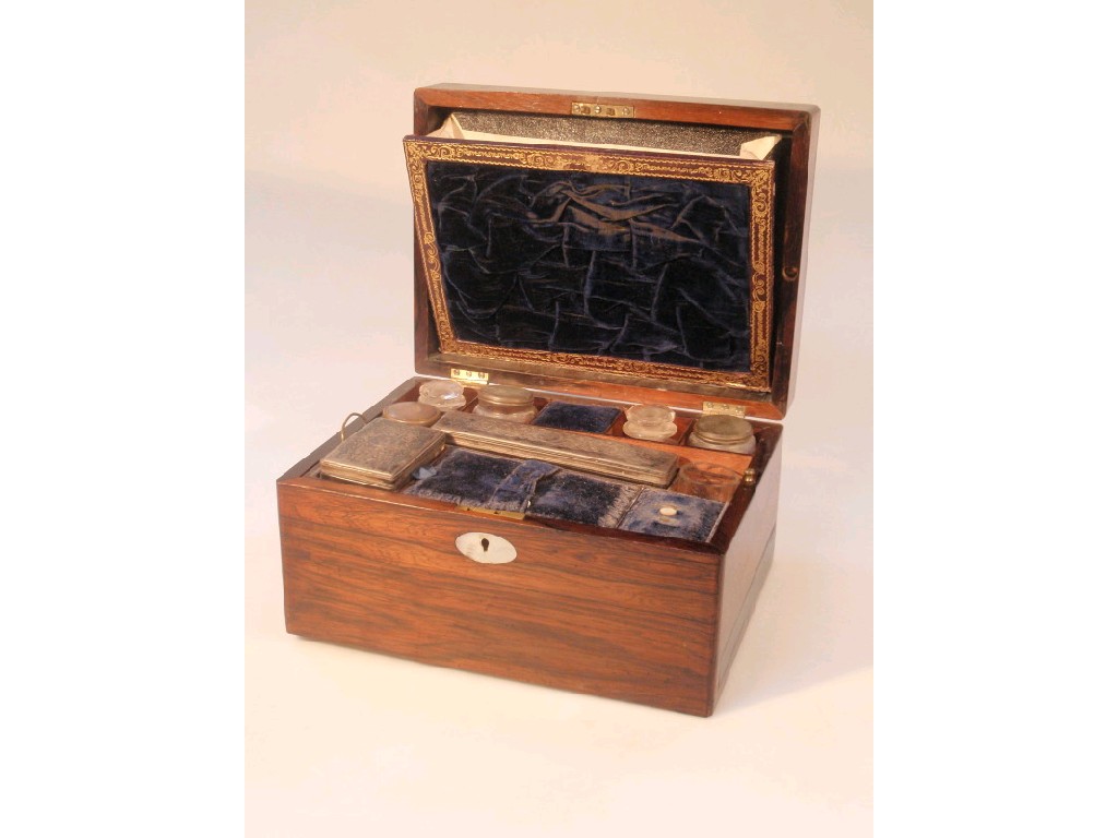 Appraisal: A Victorian rosewood vanity box with mother-of-pearl tablet and escutcheon