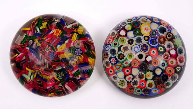 Appraisal: A MILLEFIORI GLASS PAPERWEIGHT with polychrome decoration cm diameter and