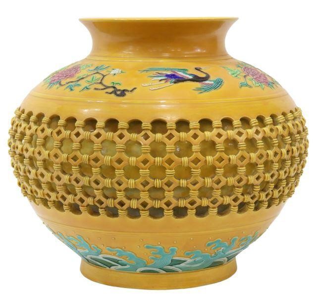 Appraisal: Chinese porcelain double-walled lattice vase in an Imperial yellow glaze