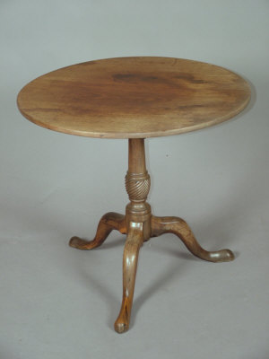 Appraisal: A George III mahogany tripod table the circular top upon